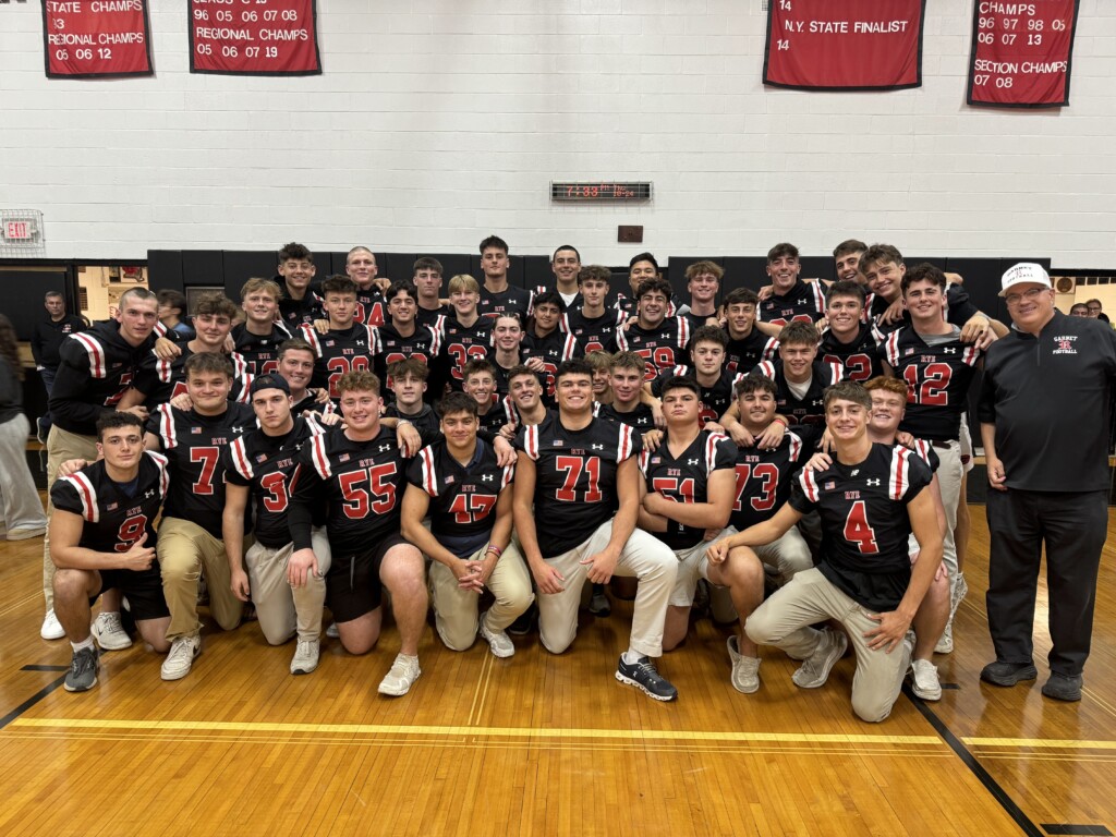 (PHOTO: The Varsity Football Team at the annual pre-Rye - Harrison Varsity football game pep rally and bonfire on Thursday, October 24, 2024.)