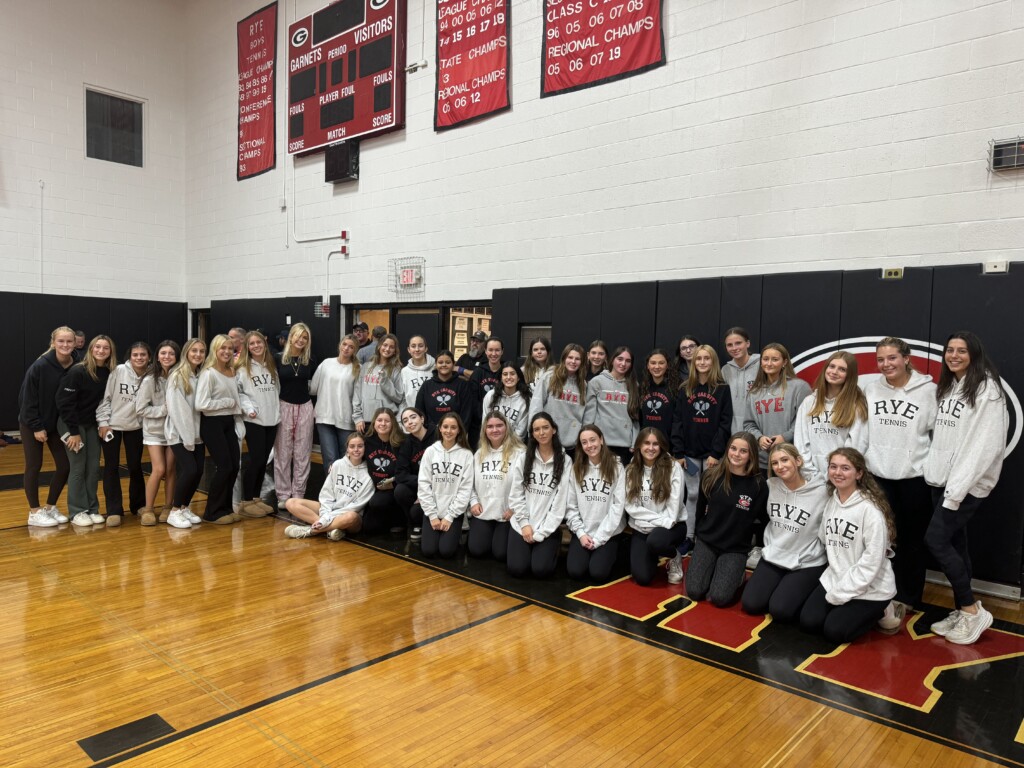 (PHOTO: The Girls Tennis Team at the annual pre-Rye - Harrison Varsity football game pep rally and bonfire on Thursday, October 24, 2024.)