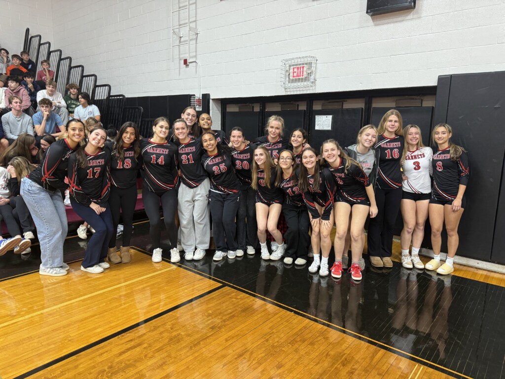 (PHOTO: The Girls Varsity Volleyball Team at the annual pre-Rye - Harrison Varsity football game pep rally and bonfire on Thursday, October 24, 2024.)