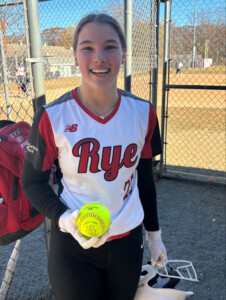 (PHOTO: Rye Rockets player Charlotte Dinger hit an out of the park home run during the 2024 championship game.)