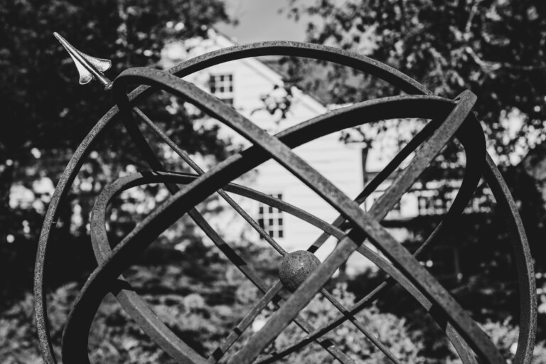 (PHOTO: Sundial in the Baronio Memorial Garden. Donated in 1976, the garden sits behind the Square House Museum. By Stacy Massey, author of Fall in Love with Rye.)