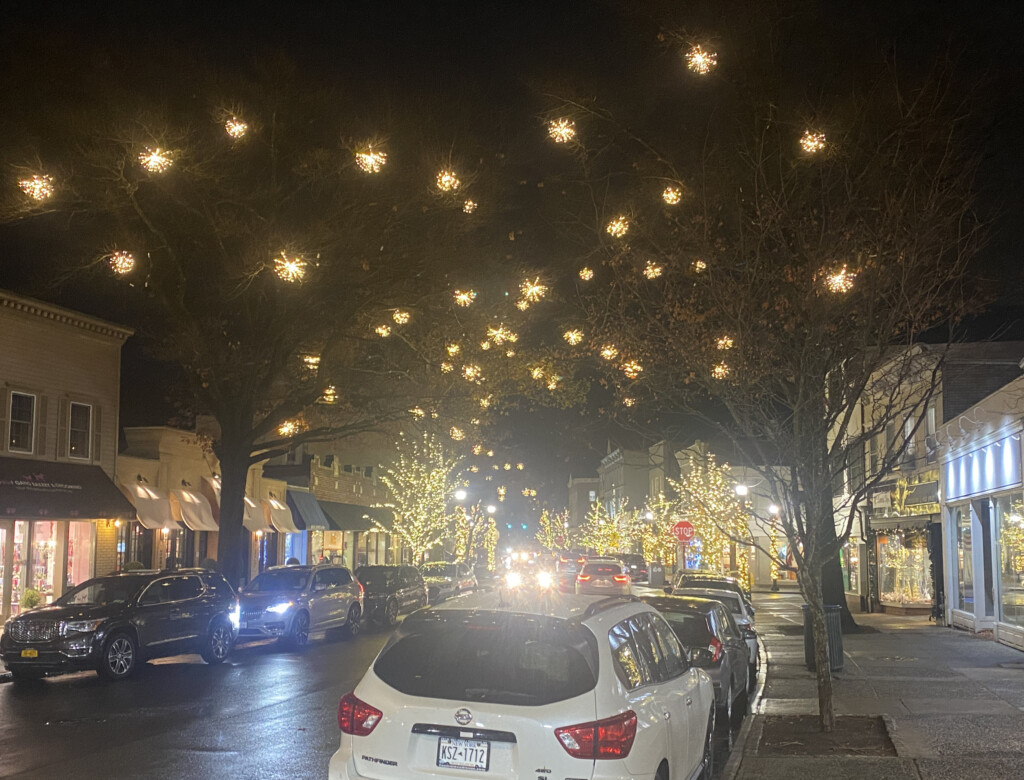 (PHOTO: New winter lights debuted on downtown Purchase Street this week and are expected to remain until early February 2025. Donations from nearly 200 individuals and businesses funding the installation.)