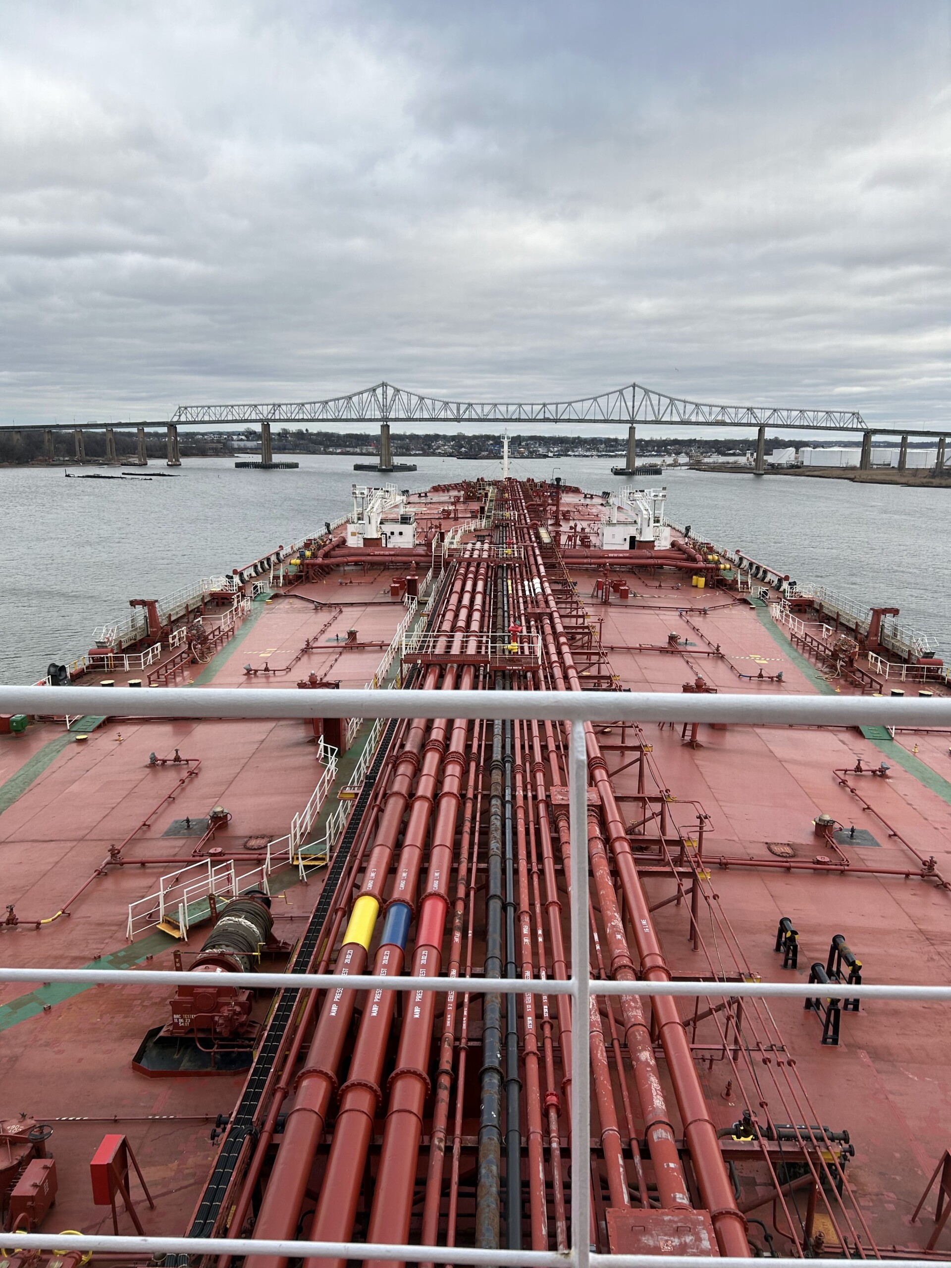 (PHOTO: An oil tanker approaching the Outerbridge Crossing that spans the Arthur Kill between Perth Amboy and Staten Island.)