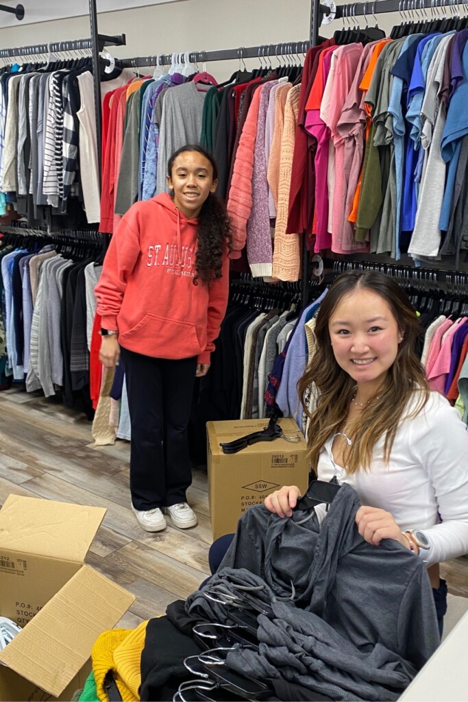 (PHOTO: Volunteers restocking The Sharing Shelf's Teen Boutique. Contributed.)