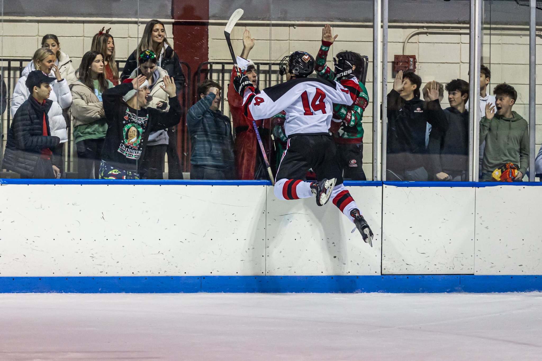 (PHOTO: Rye's Dean Kim celebrates a shorthanded goal during the 1st period of his team's 10-0 win over Byram Hills.)