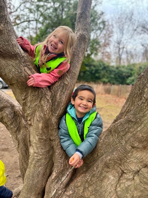 (PHOTO: Two of the Friends of Rye Nature Center's five-day Forest Preschool students hanging out in their classroom. Contributed.)