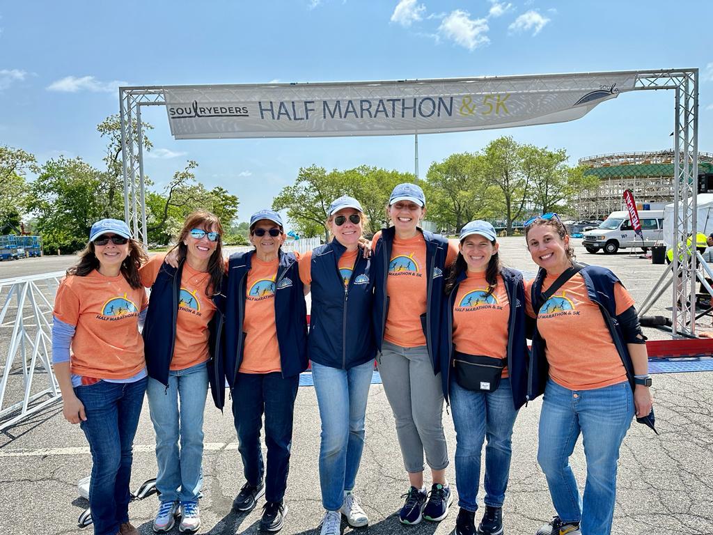 (PHOTO: The Soul Ryeders leadership team at the 2024 Half Marathon and 5K (L to R): Roseanne Braiotta, Christine Lombardo, Susan Marynowski, Lesley Findlay, Heidi Kitlas, Stacy Weissberg and Rachel Felenstein. Contributed.)