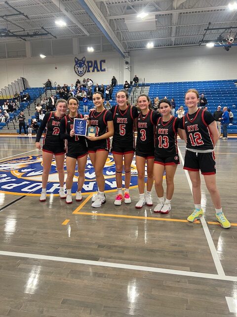 (PHOTO: The Rye Girls Basketball Team after defeating the host Mahopac Wolf Pac 58-44 in the Mahopac Tournament championship game.)