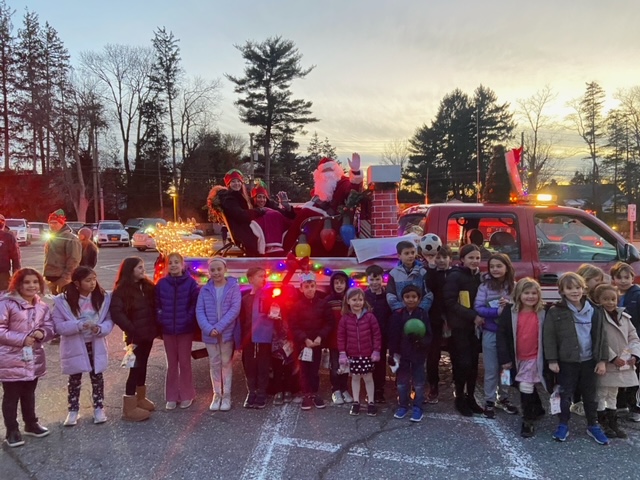 (PHOTO: The Rye FD Candy Cane run visits Kids’ S.P.A.C.E. of Rye. Contributed.)