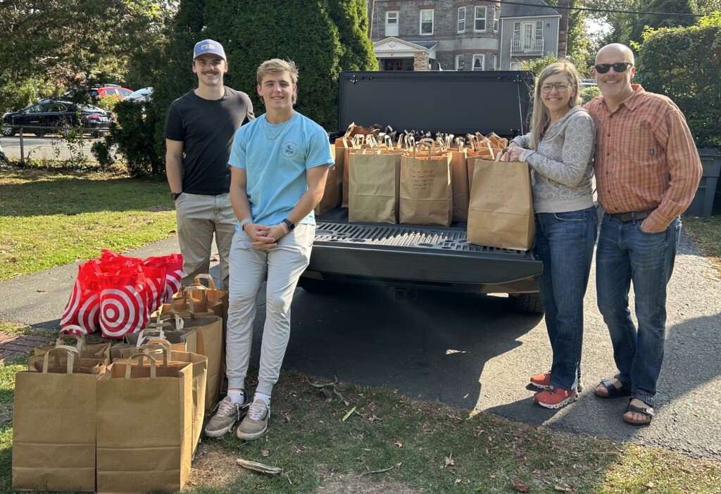 (PHOTO: Community Members delivering donated groceries to the Bread of Life Pantry. Contributed.)