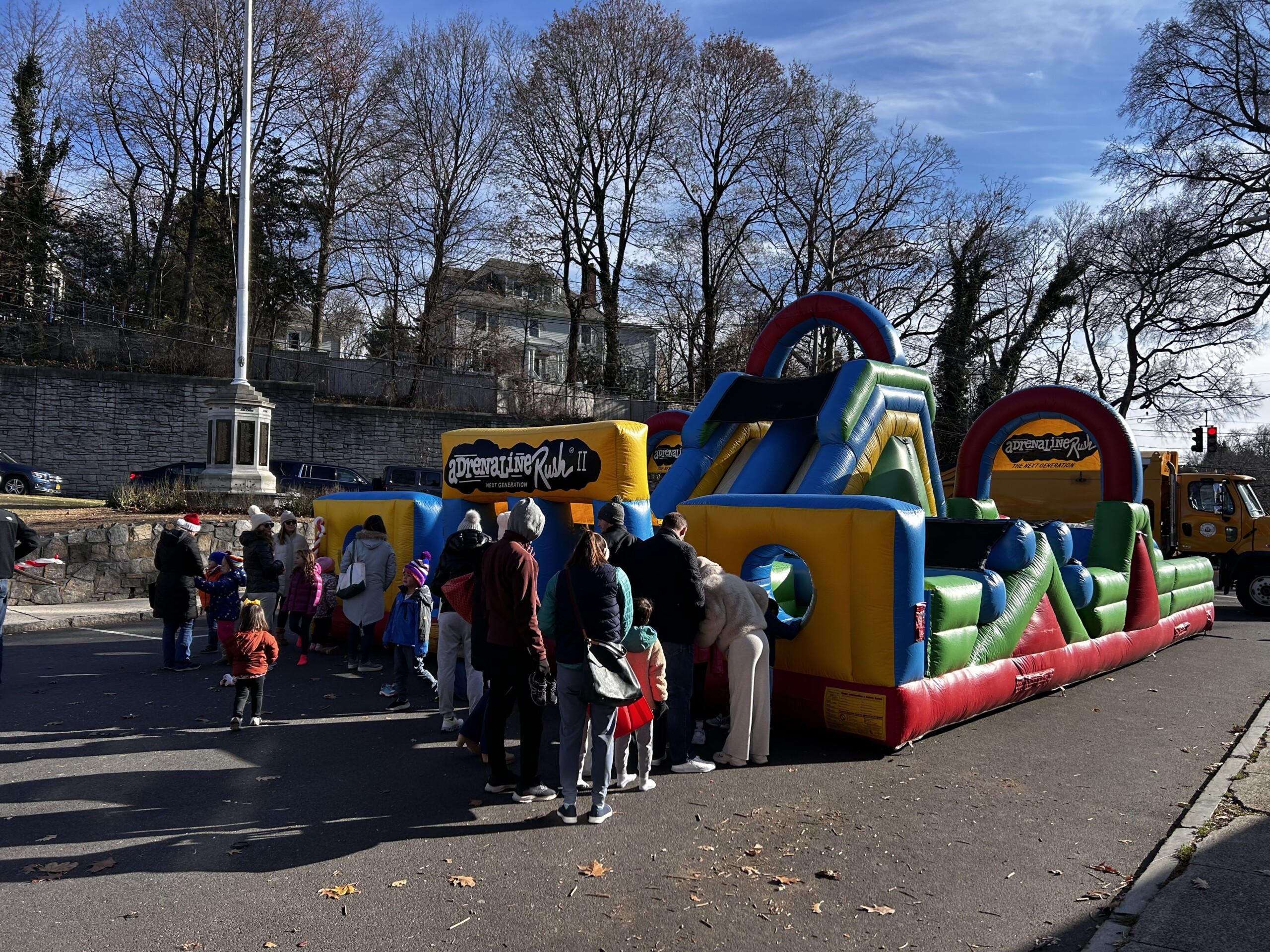 (PHOTO: A bouncy castle obstacle course was set up in front of the Square House Museum.)