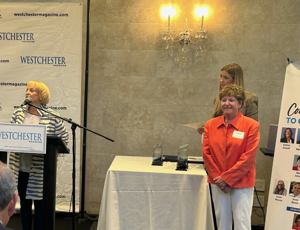 (PHOTO: SPRYE Executive Director Marie Johnson receiving the Healthcare Hero Award 2024 from Board Member Lauren Miscimarra. Contributed.)