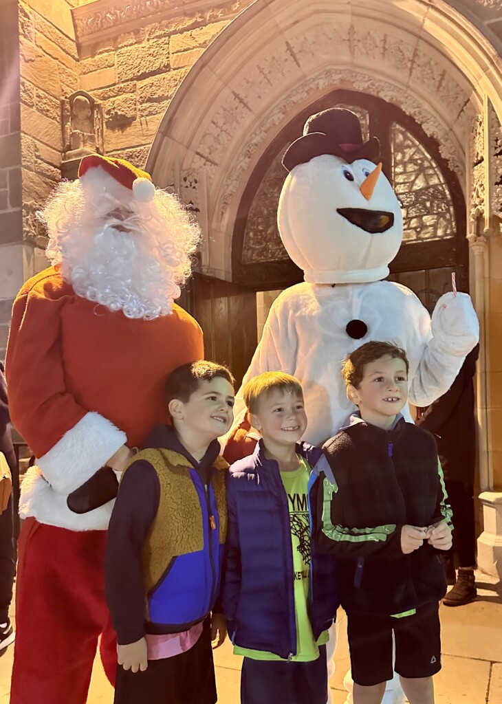 (PHOTO: The annual lighting of the Resurrection Church Christmas trees was held on Saturday, December 7, 2024. Santa Claus and Frosty the Snowman posed for photos. Contributed.)