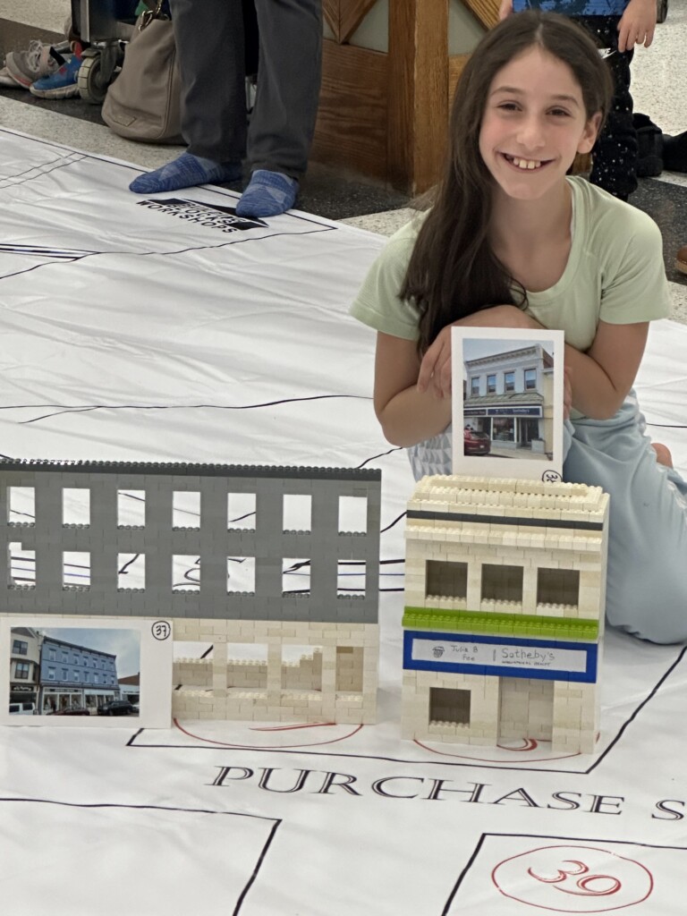 (PHOTO: Building Rye history with Legos at the Rye Historical Society. Contributed.)