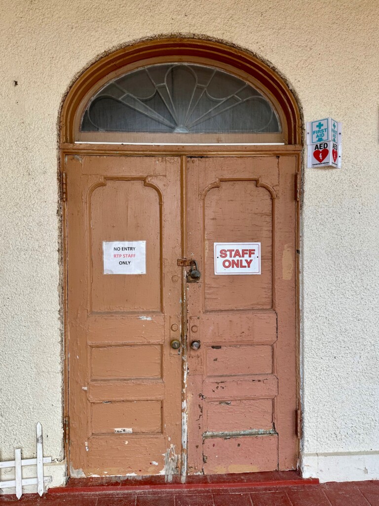 (PHOTO: The Friends of Rye Town Park worked on renovating the Tower Building doors and transom windows. Here they are prior to restoration. Contributed.)