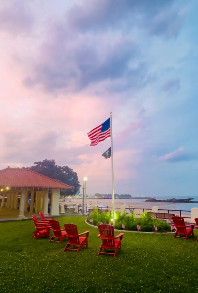 (PHOTO: The Friends of Rye Town Park renovated the Tower Building Plaza, making bthe foundtain into a planter with native graases and adding red adirondack chairs. Contributed.)