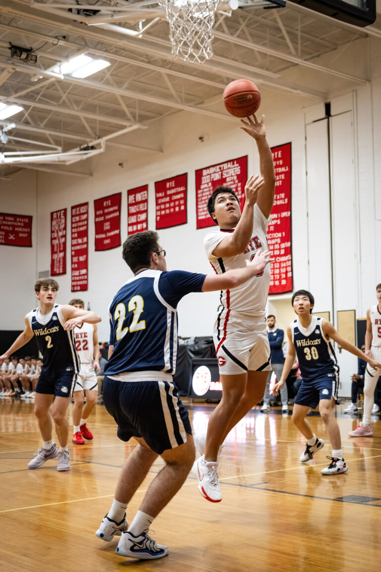 (PHOTO: Andrew Wilmarth from Rye Boys Basketball's win over Rye Country Day. Wilmarth scored 10 points in their latest victory over Suffern.)