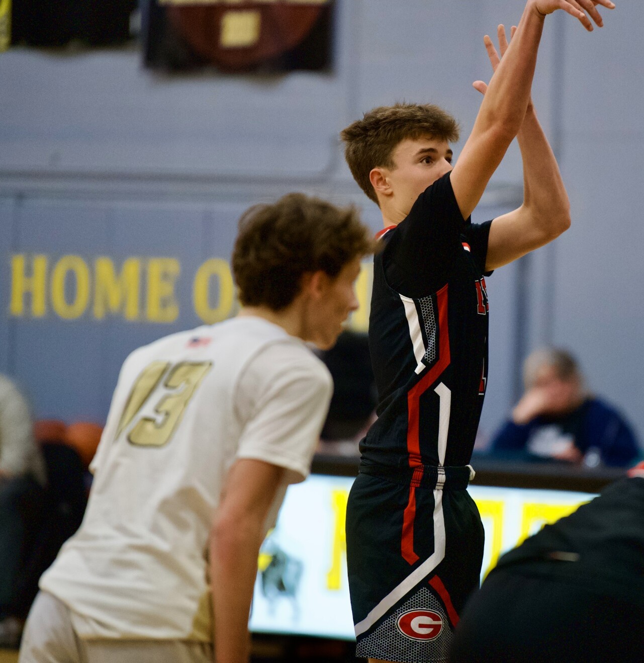 (PHOTO: Sophomore point guard Ben Johnson attempting a free throw in his team's 67-64 OT loss to Nanuet.)