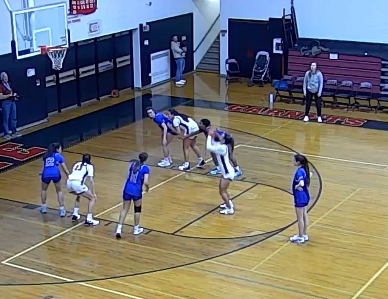 (PHOTO: The Garnets shooting free throws late in the fourth quarter of their 65-54 win vs Henry Hudson.)