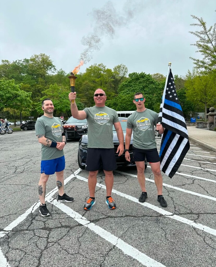 (PHOTO: Rye PD Detective and Rye PBA President Gabe Caputo (center) with Lt. Albert P. Hein, Patrol Commander and Sergeant and Special Operations Supervisor Lance Hinrichs at the 2024 Law Enforcement Torch Run (LETR). Contributed.)