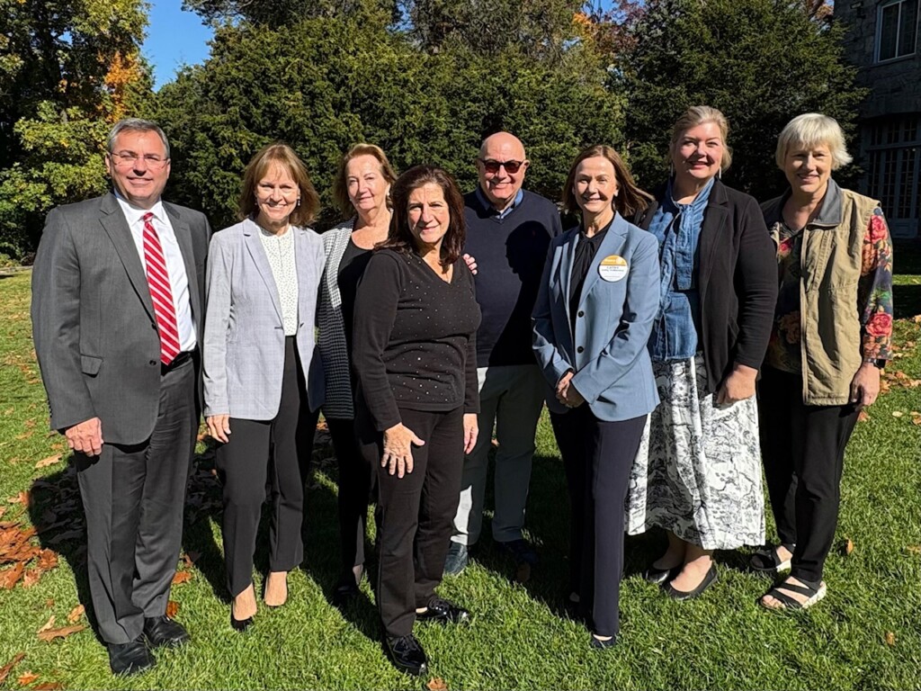 (PHOTO: Cathy DeMartino (third from right) with, from left to right, Eric Byrne, Cathy Garr, Kathy Carley-Spanier, Julie Soury Kattan, Bob Manheimer, Michele Thomas, and Lora Archer. Contributed.)