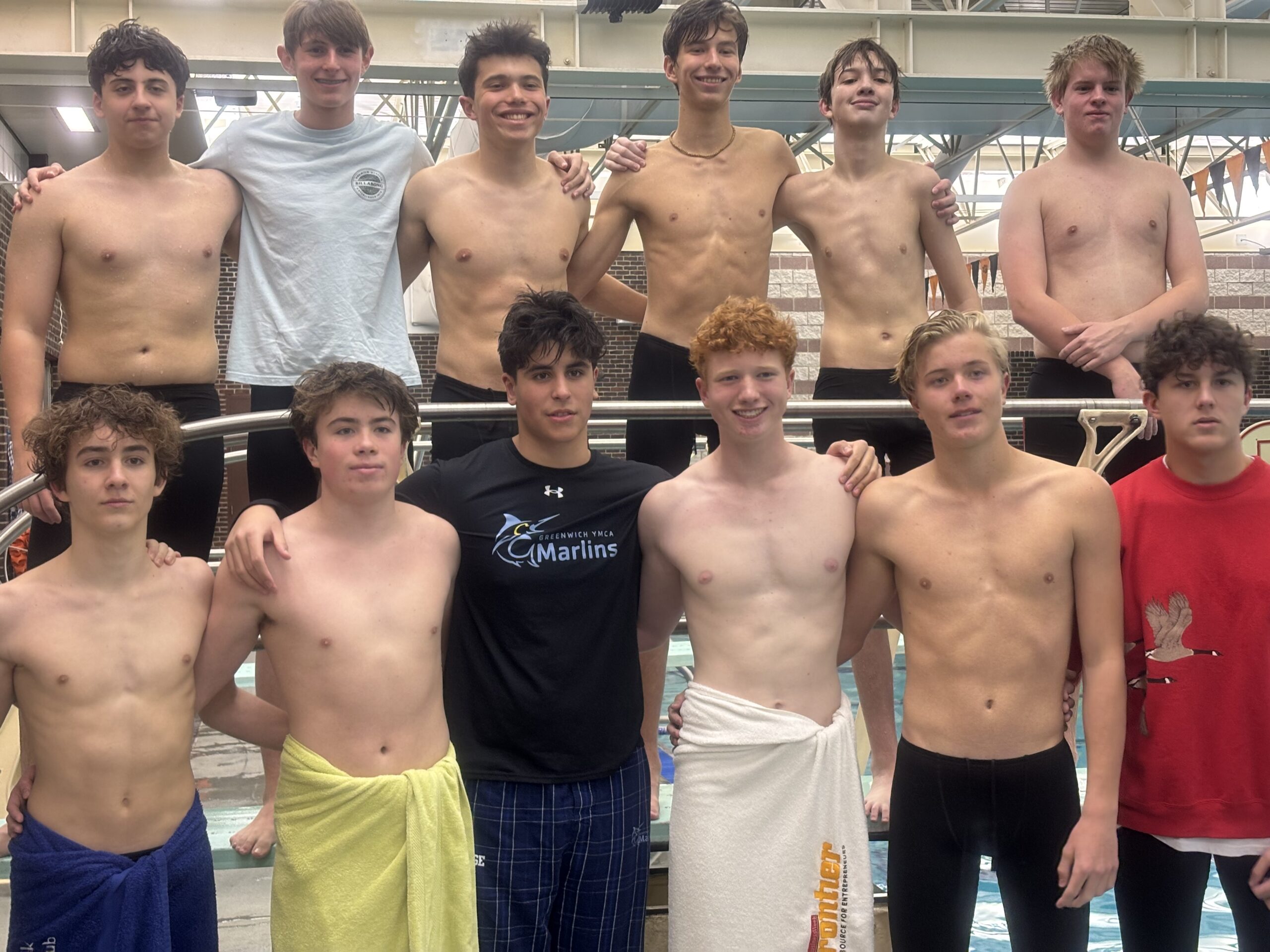 (PHOTO: Rye - Rye Neck - Blind Brook after a close win over New Rochelle - Bronxville in the pool, 92-87.)