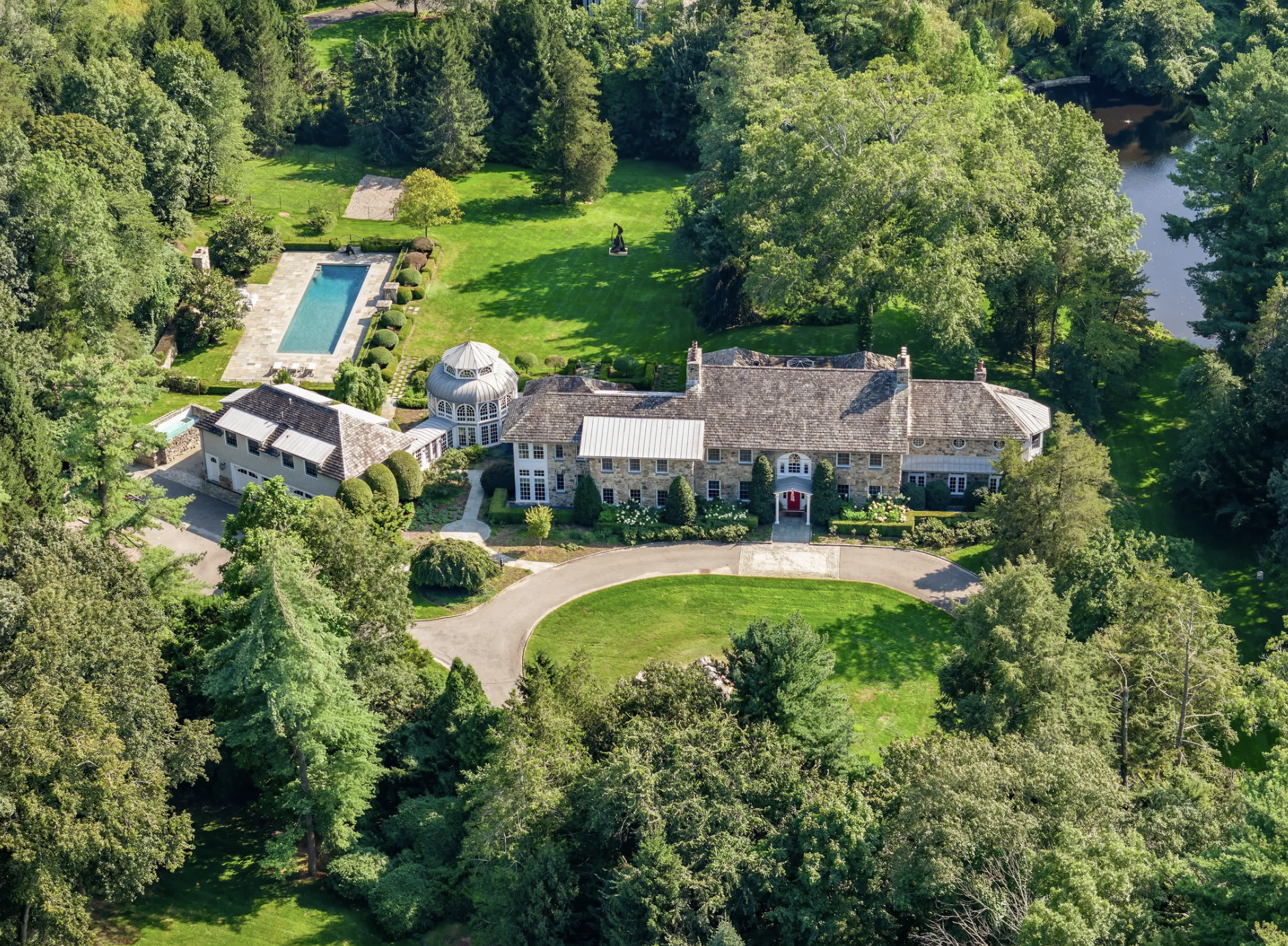 House of the Week: $21M Greenwich Estate w/ Pool, Spa & Glass Conservatory