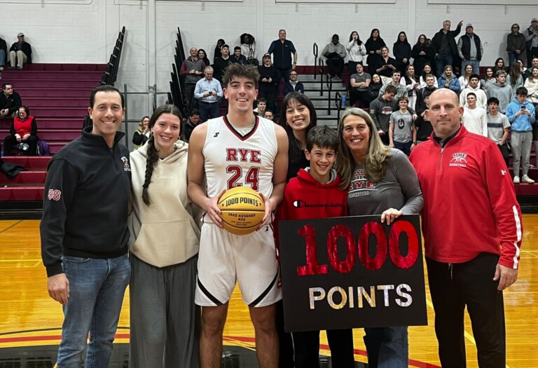 (PHOTO: Rye's Jake Kessner (#24) scored his 1000th career point in his team's 60-42 victory over Somers on Monday, January 6. Credit: Rye Athletics)