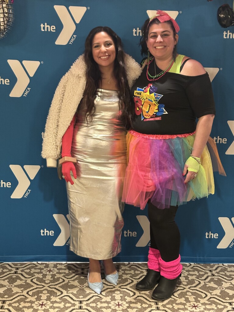 (PHOTO: At the Rye YMCA’s Dancing Through the Decades fundraiser on Friday, February 28, 2025 Amanda Polizzi and Jen Viaro. Contributed.)