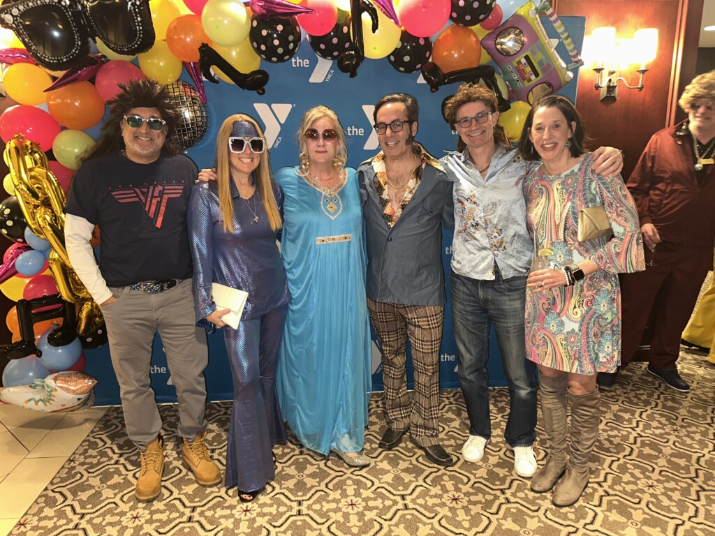 (PHOTO: It was all 70s, 80s, and 90s at the Rye YMCA’s Dancing Through the Decades fundraiser on Friday, February 28, 2025. Contributed.)