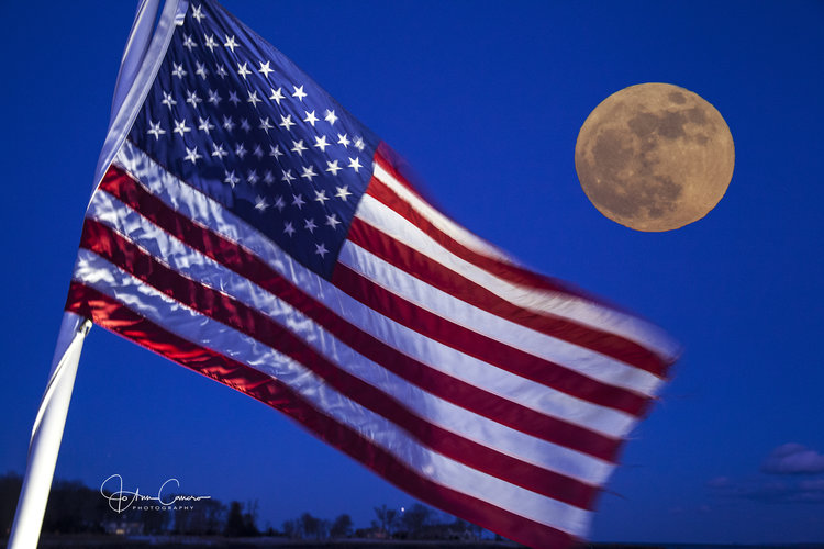 (PHOTO: The moon over the American flag that flies at Playland. By JoAnn Cancro.)