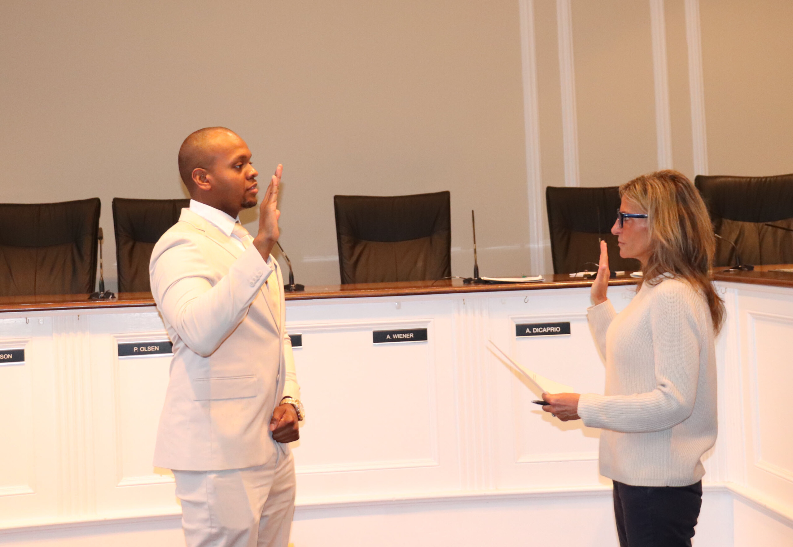 (PHOTO: The City of Rye's newest police officer, Stephen Rose, age 29, was sworn in on Monday, March 24, 2025 at Rye City Hall by City Clerk Noga Ruttenberg. Contributed.)