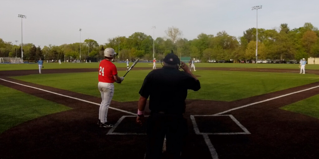 (PHOTO: Rye Baseball's Charlie Rupp just before a sacrifice fly against Pelham on Tuesday, April 29. Credit: Game Changer.)