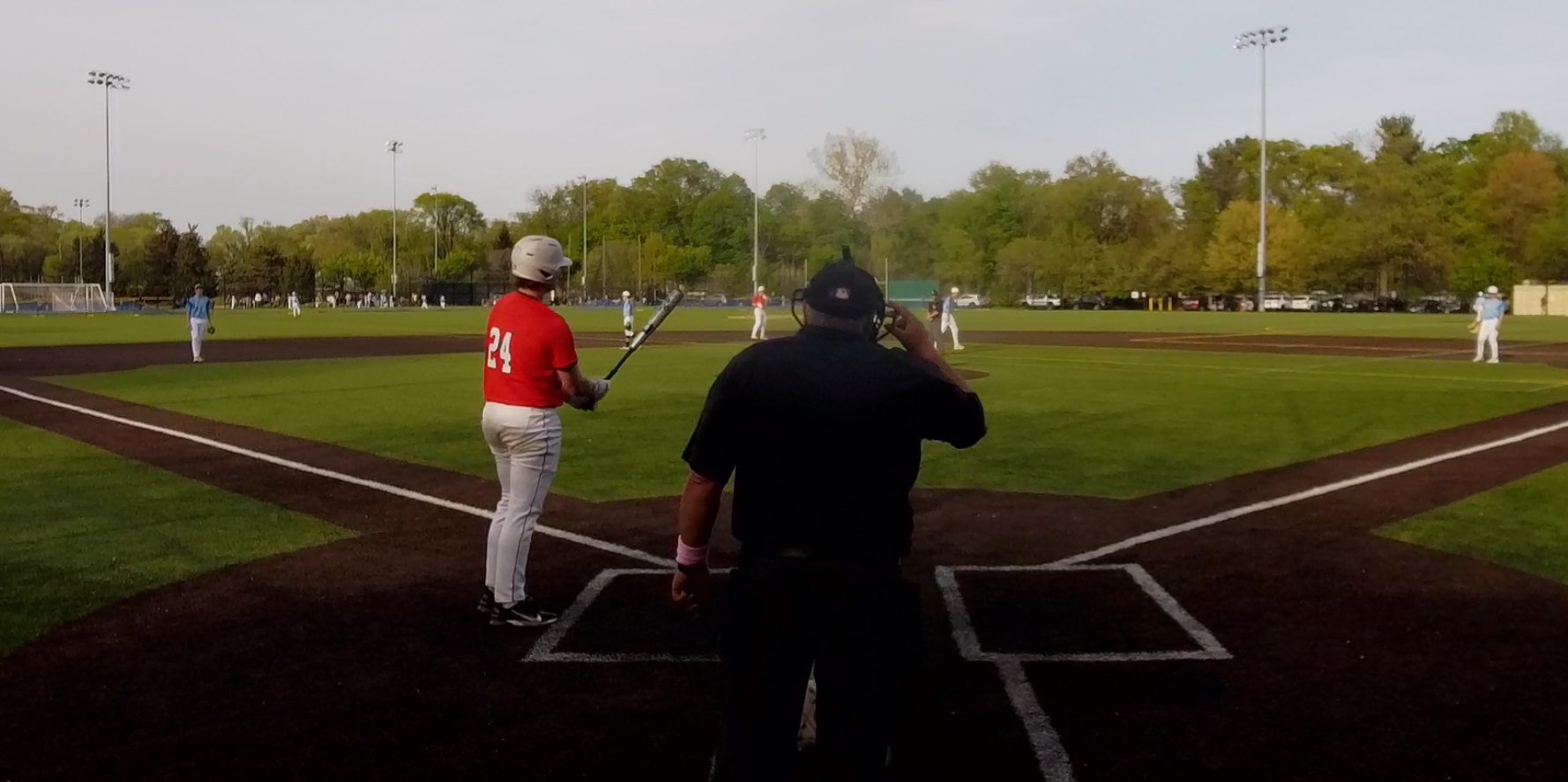 (PHOTO: Rye Baseball's Charlie Rupp just before a sacrifice fly against Pelham on Tuesday, April 29. Credit: Game Changer.)