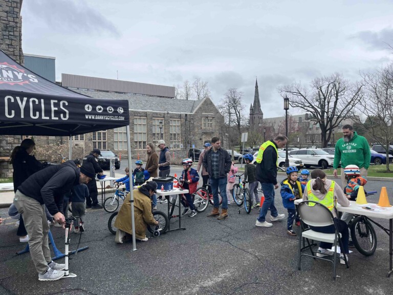 (PHOTO: The annual Traffic and Pedestrian Safety Bike Rodeo, put on by the Traffic and Pedestrian Safety Committee and the Rye PD at Rye High School parking lot, drew about 100 children on Sunday, April 6th, 2025. Contributed.)