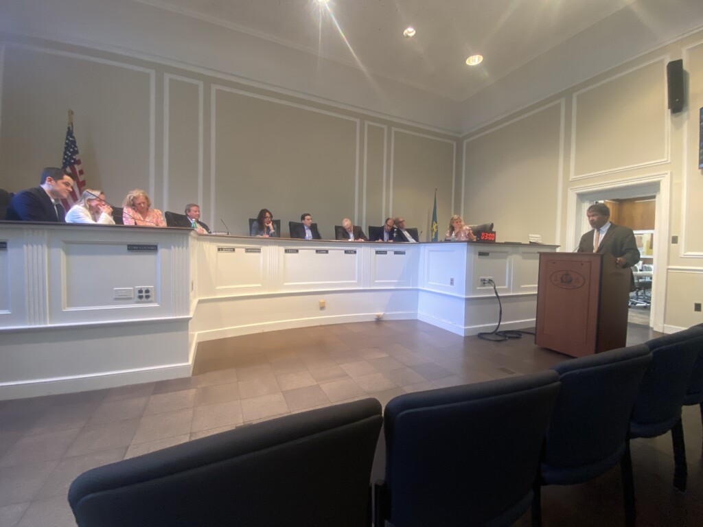 (PHOTO: NY-16 Congressman George Latimer at the Rye City Council on April 23, 2025 where he warned the City to expect federal cuts to "trickle down" and impact Rye and other surrounding communities.)