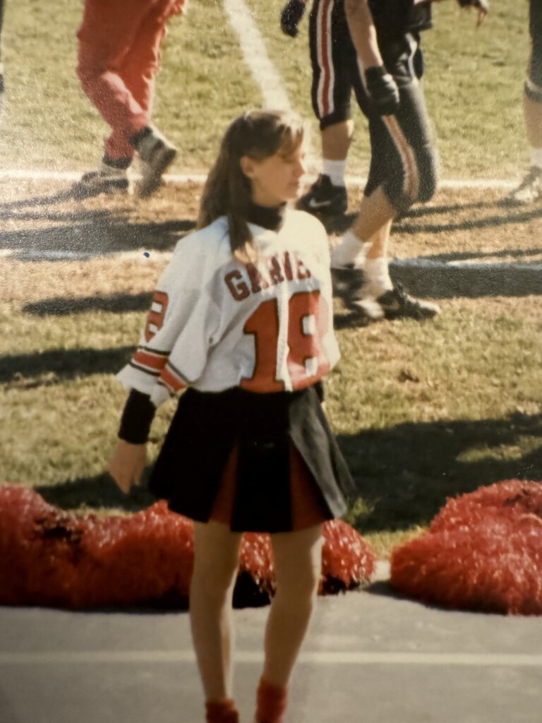 (PHOTO: Rye Lifer Kendra Moran when she was the Rye High School cheerleading captain in 1991. Contributed.)