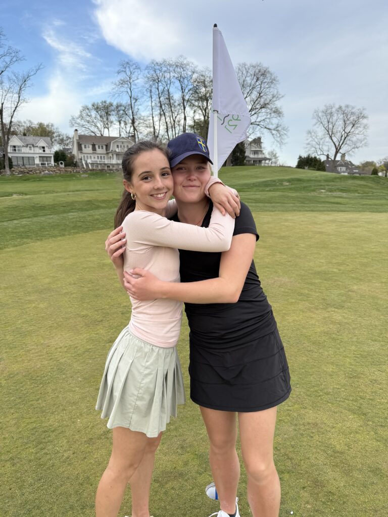 (PHOTO: The leadership of Rye Girls Golf captains Laeticia Clauss (left) and Matilda Glitterstam (right) was key to Rye’s victory over Harrison on Tuesday, April 22. Contributed.)