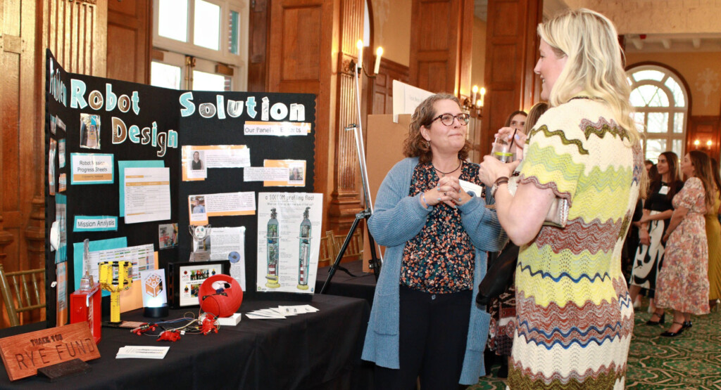 (PHOTO: Rye Fund for Education's annual gala on April 3, 2025 raised over $530,000. RMS engineering teacher Susan Granata showcasing the Ryebotics grant. Contributed.) 