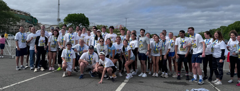 (PHOTO: Team Carpe Diem in 2024 when they raised $18,700. The nautical flags on their shirts spell "carpe diem" as Kuni Nakamura enjoyed boats and fishing. Contributed.)