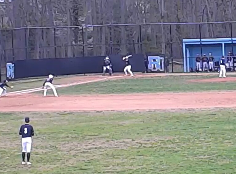 (PHOTO: Rye Baseball's Charlie Rupp at the plate in the top of the fourth inning against Rye Neck on Friday, April 11. Rupp doubled in this at-bat and his team won 11-1.)