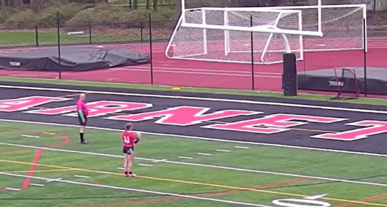 (PHOTO: Rye Girls Rugby's Molly Kennedy linig up a conversation kick in game two of a season-opening split vs Harvey on Thursday, April 10.)