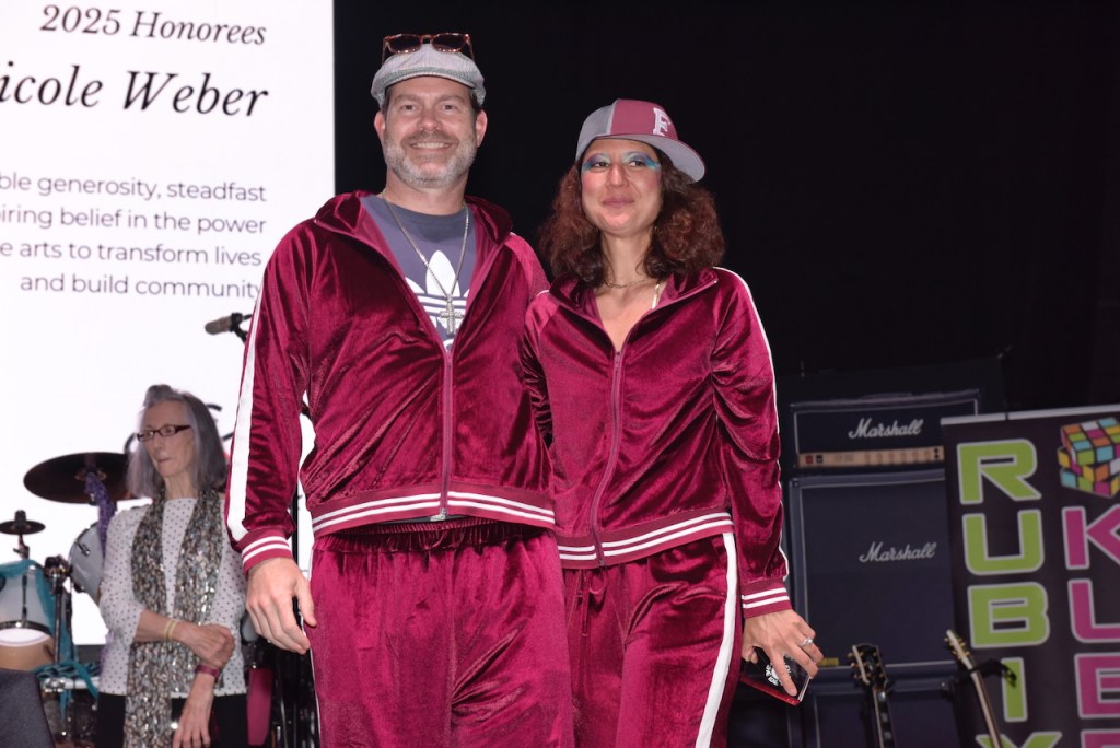 (PHOTO: The Rye Arts Center’s annual benefit Studio 51 on May 15, 2025, raised a record $320,000. Honorees, Rob & Nicole Weber in their track suits. Contributed. Credit: Leslye Smith.)
