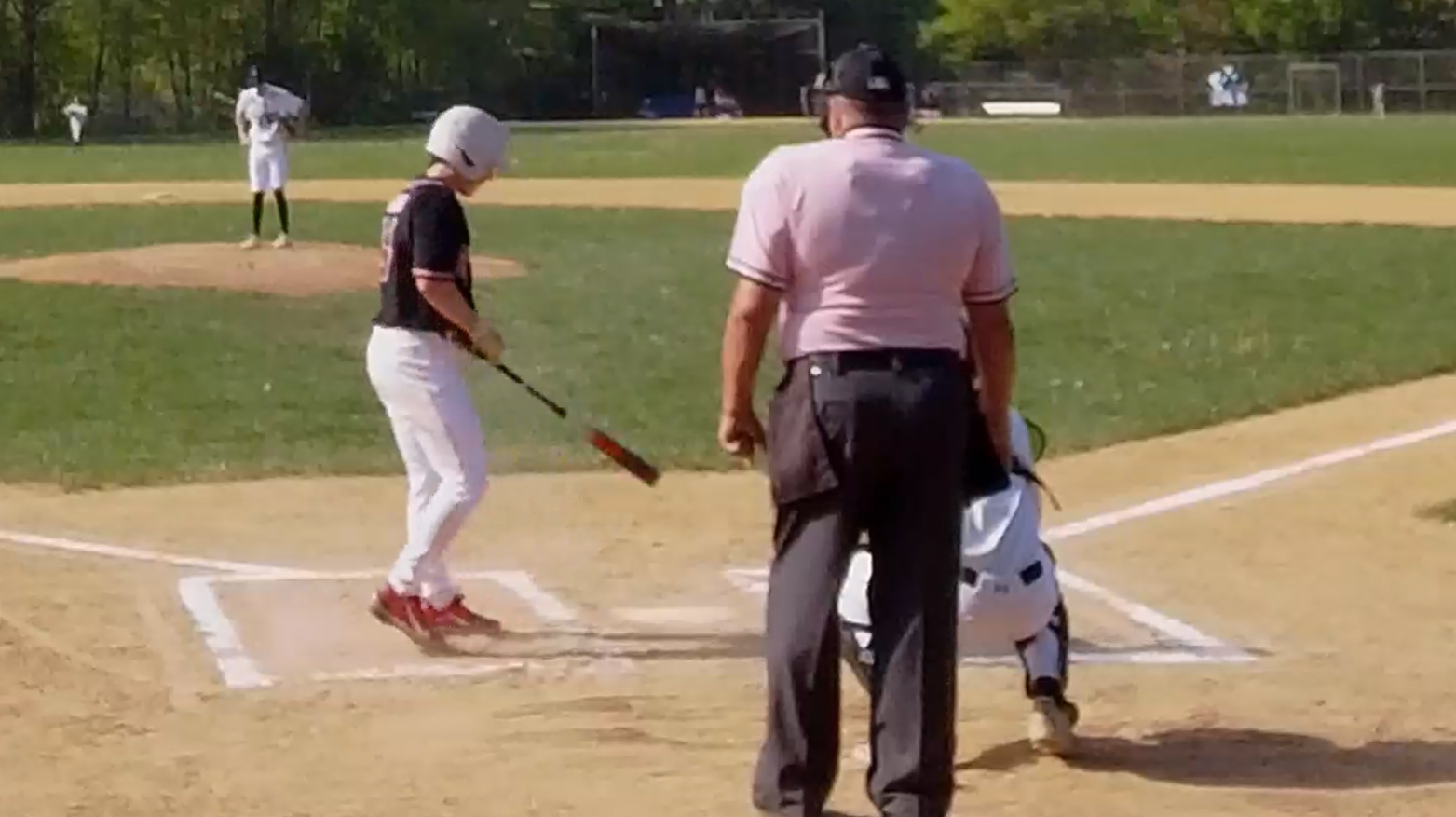 (PHOTO: Rye Baseball's Nolan Hutson (#14) led off the game against Edgemont on Friday, May 2, with his first career varsity home run. Credit: Game Changer.)