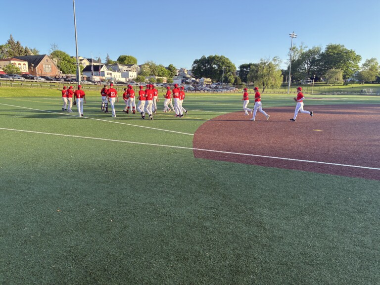 (PHOTO: Rye Baseball celebrated a 5-3 comeback victory against Harrison on Saturday, May 10.)