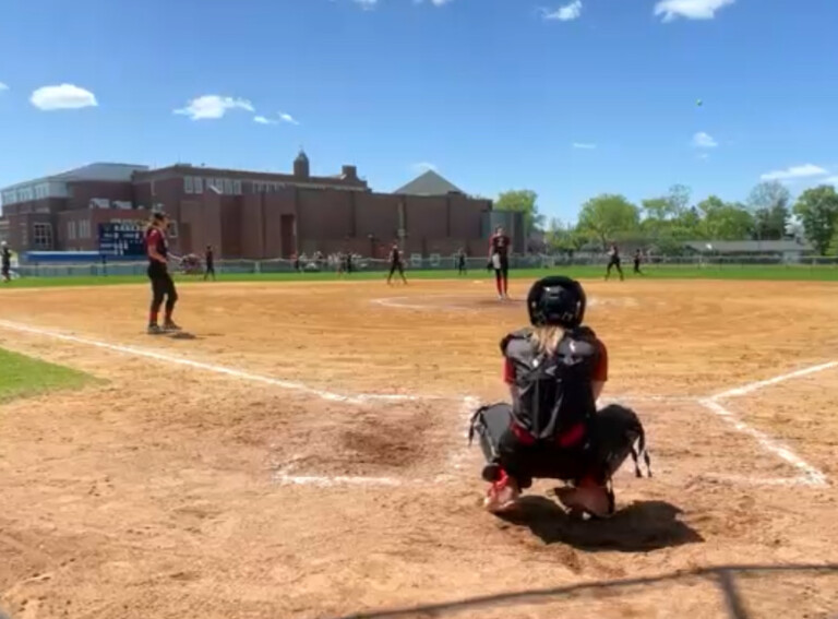 (PHOTO: Rye Softball warming up before an inning against Eastchester on Sunday, May 13. Credit: Game Changer.)