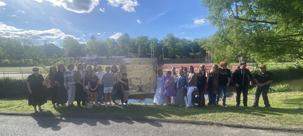 (PHOTO: Supporters of the Spring for Rye team at the dedication on May 20, 2025. Two hundred native trees were planted across all four school campuses in Rye.)