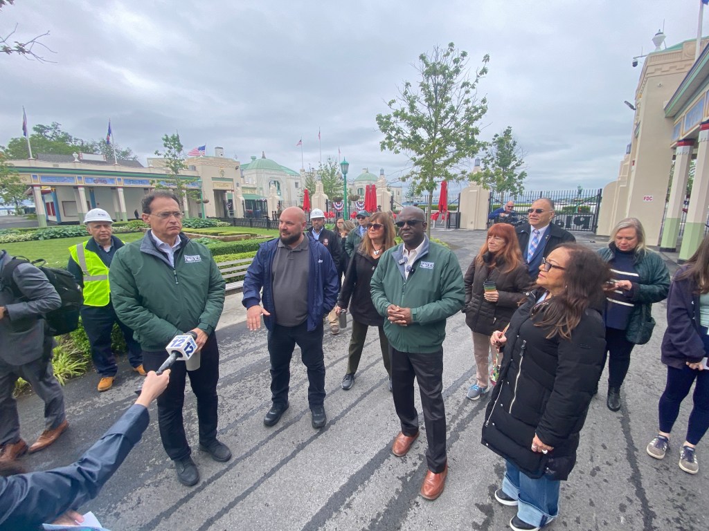 (PHOTO: Westchester County Executive Ken Jenkins speaks with local media during a Playland Park walk-through on Friday, May 23, 2025.)