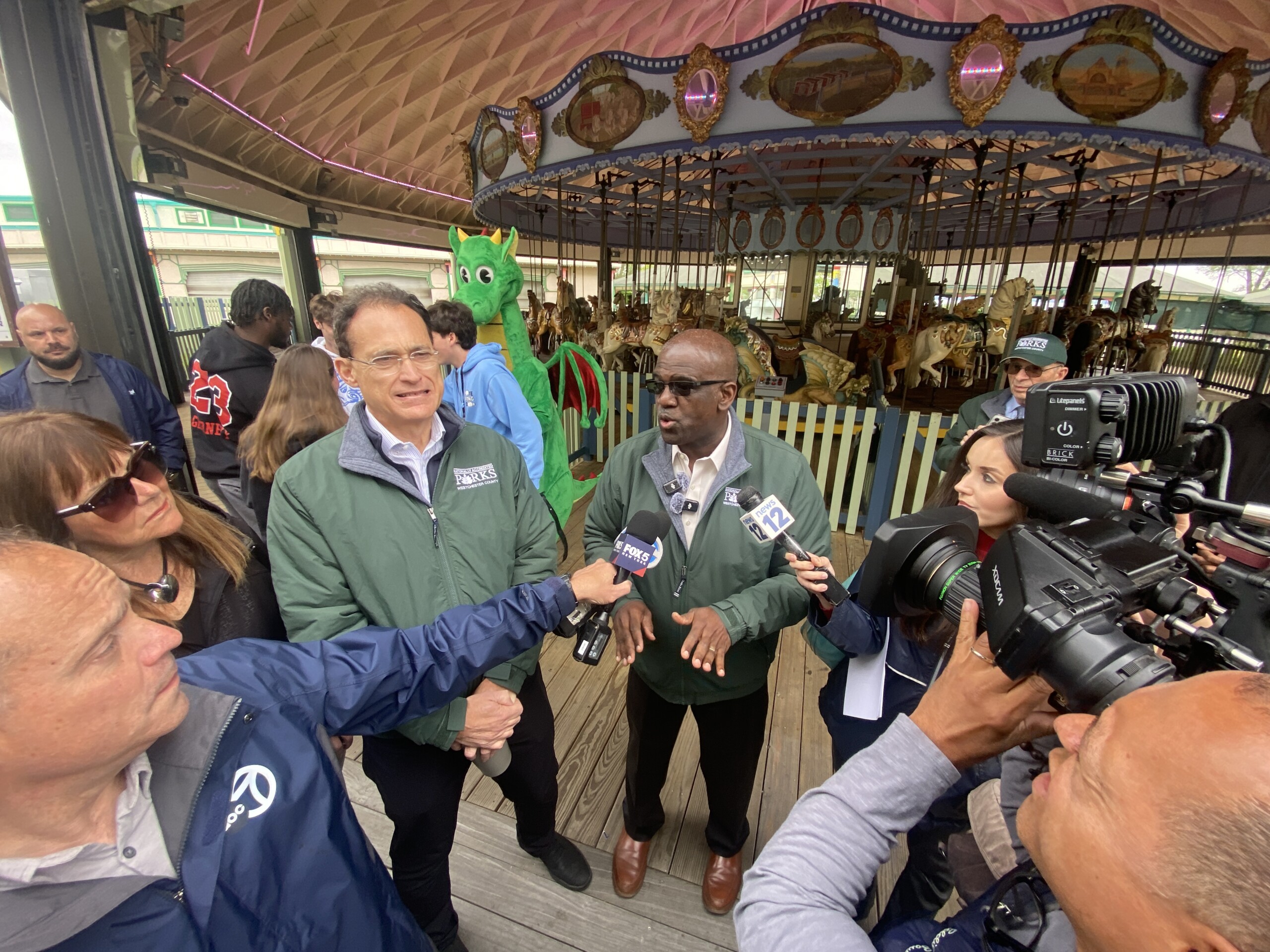 (PHOTO: Westchester County Executive Ken Jenkins speaks with local media during a Playland Park walk-through on Friday, May 23, 2025.)
