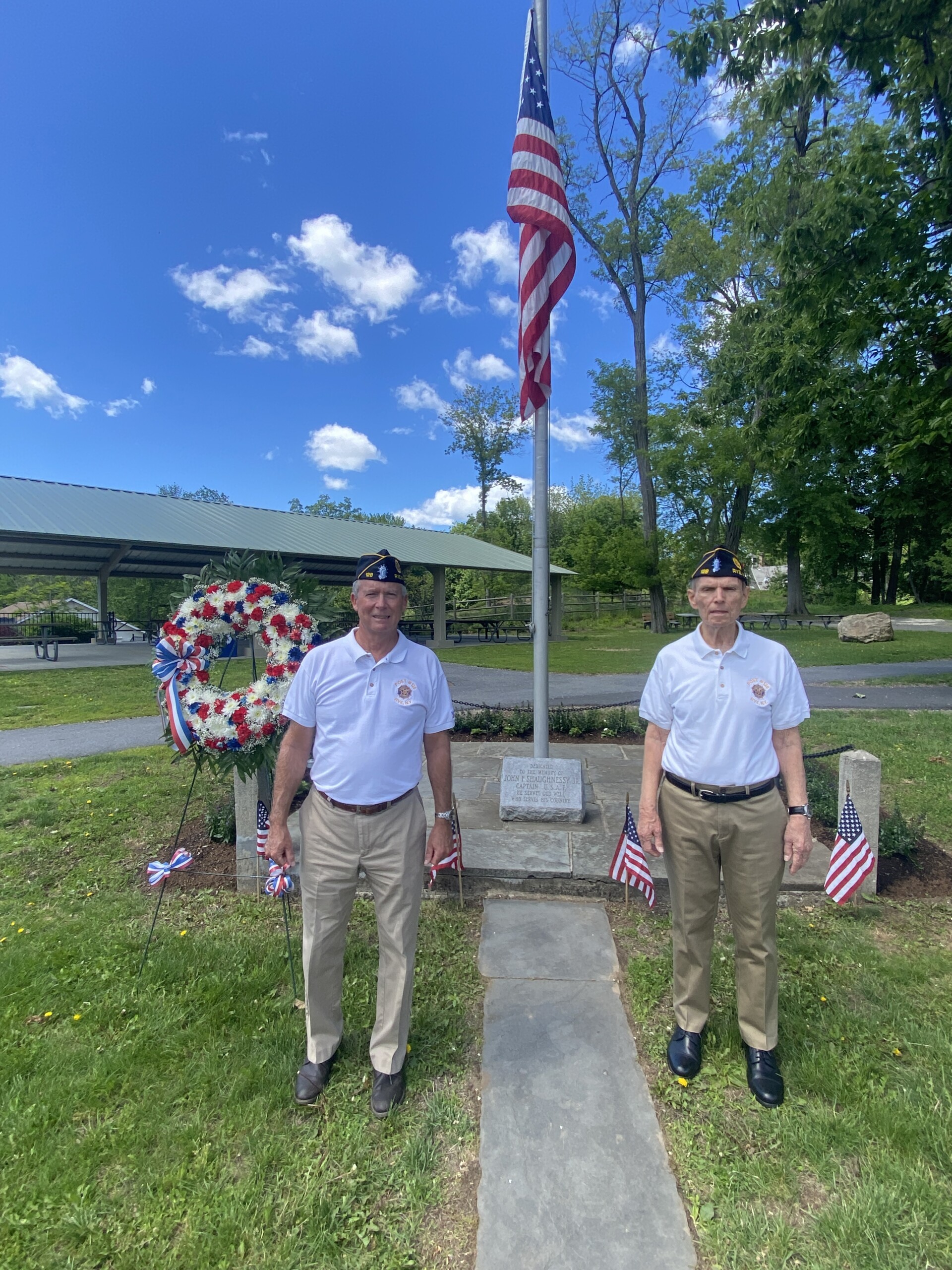 (PHOTO: Memorial Day 2025 in Rye. American Legion Post 128 Adjutant Tim Moynihan and Commander Fred de Barros honor Vietnam veteran John F. Shaughnessy Jr. at Rye Recreation following the larger ceremony on the village green.)